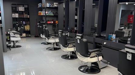Modern interior of Jeddah 30 Degrees Barbershop Alnaeem, Jeddah, Makkah Province, SA, showcasing sleek barber chairs.