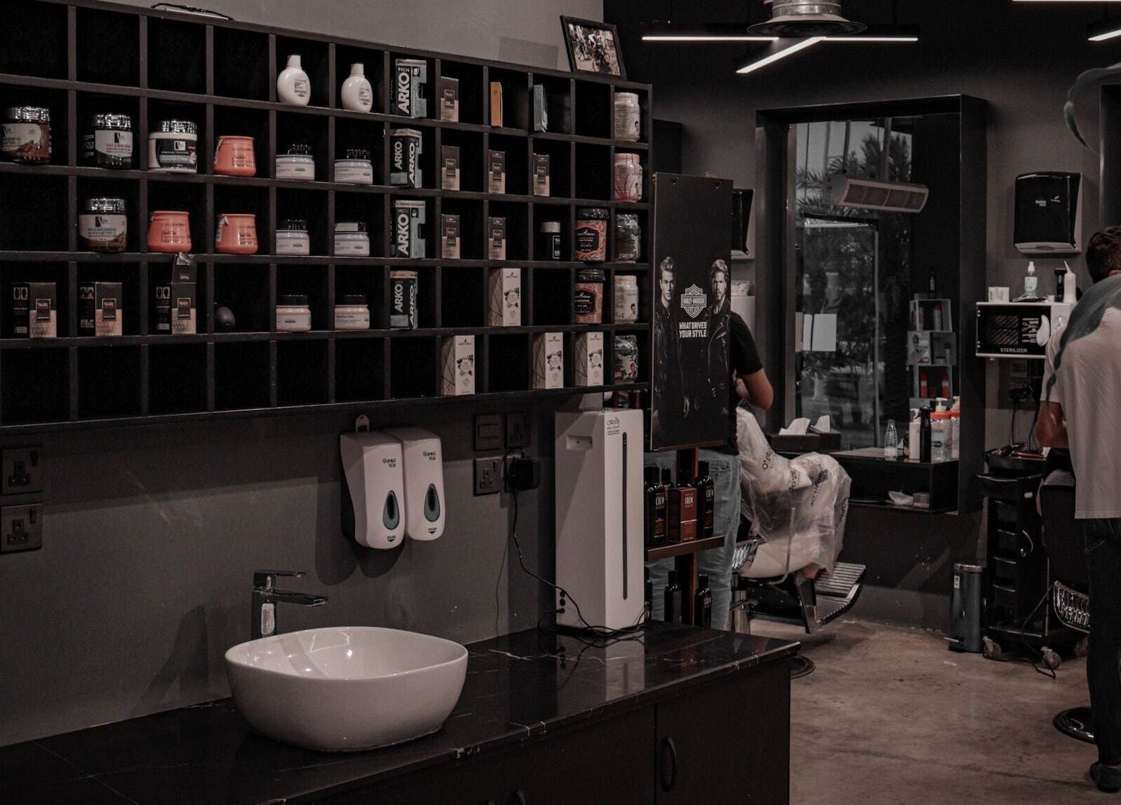 Modern salon interior at AlWaha 30 Degrees, Riyadh, منطقة الرياض, SA featuring stylish shelves and seating.