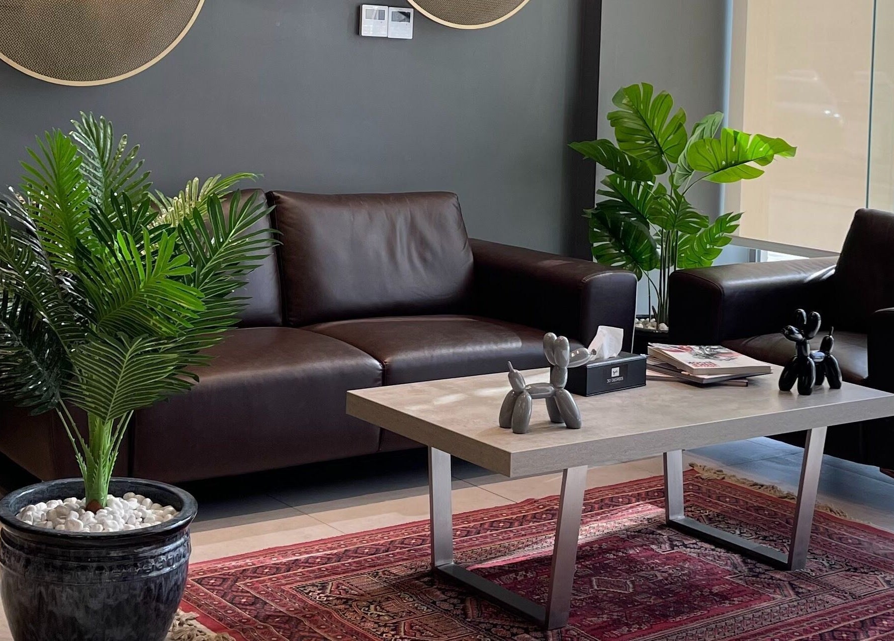 Stylish lounge area at Al Malqa 30 Degrees, Riyadh, Riyadh Province, SA with leather seating and decor.