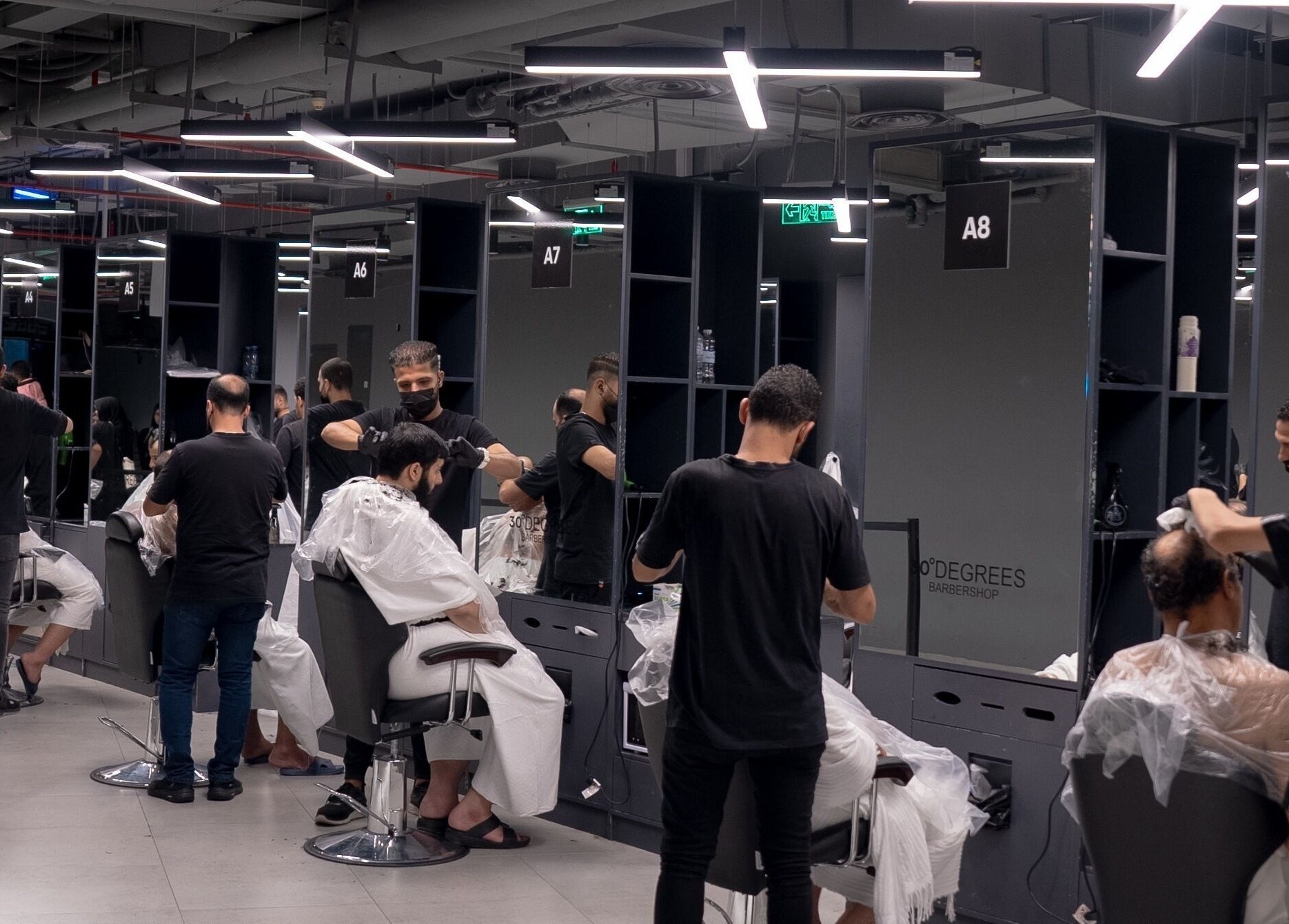 30 Degrees Clock Tower barbers in action, Makkah, Makkah Province, SA.