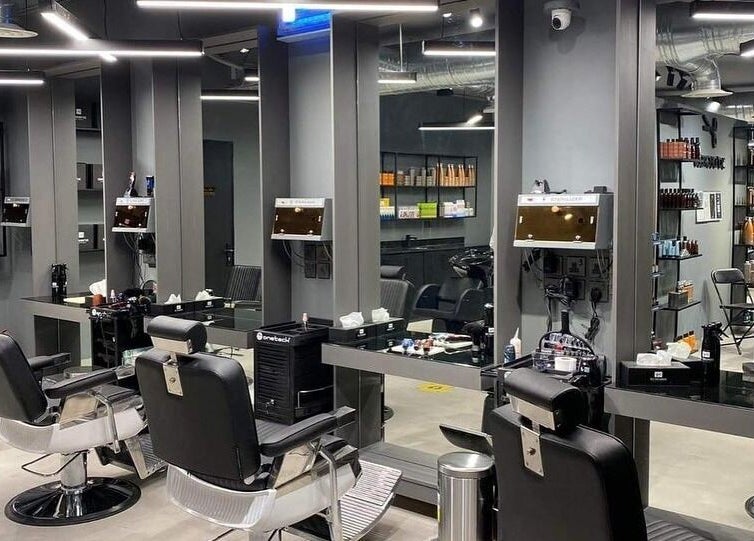 Modern salon at Al Aarid | 30 Degrees, Riyadh, Riyadh Province, SA showcasing sleek styling chairs and tools.