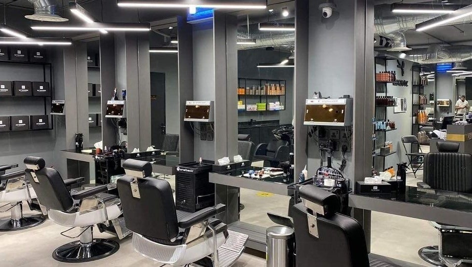 Modern salon interior at AlYasmin 30 Degrees, Riyadh, Saudi Arabia, SA featuring sleek chairs and mirrors.