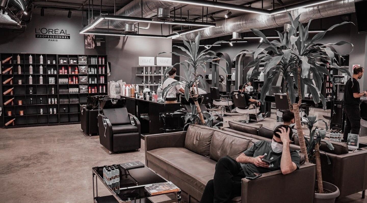 Modern salon interior at AlYasmin 30 Degrees, Riyadh, Saudi Arabia, SA, showcasing luxury seating and hair stations.