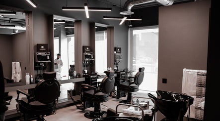 Modern salon interior at AL Falah 30 Degrees, Riyadh, Riyadh Province, SA with sleek chairs and large mirrors.