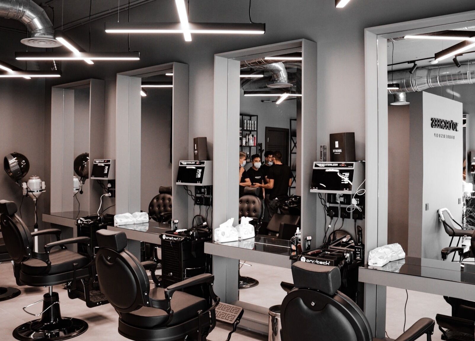 Modern salon interior at AL Falah 30 Degrees, Riyadh, Riyadh Province, SA, featuring stylish hair stations.