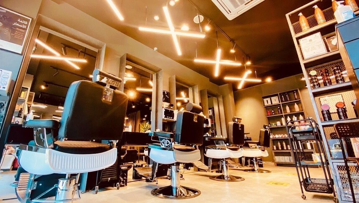 Stylish barber chairs at Qurtubah 30 Degrees, Riyadh, Riyadh Province, SA, offering modern grooming services.