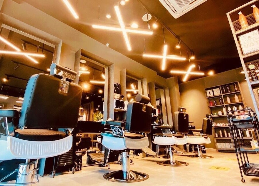 Stylish barber chairs at Qurtubah 30 Degrees, Riyadh, Riyadh Province, SA, offering modern grooming services.