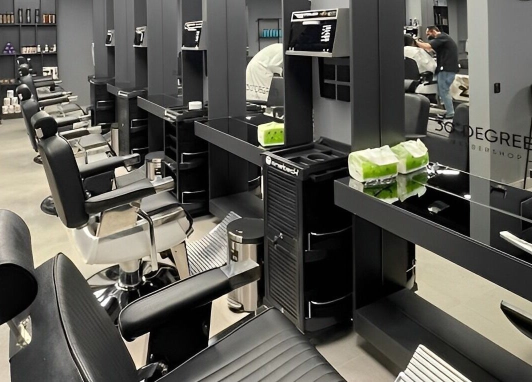 Modern barber chairs at Qurtubah 30 Degrees in Riyadh, Riyadh Province, SA showcasing professional setup.