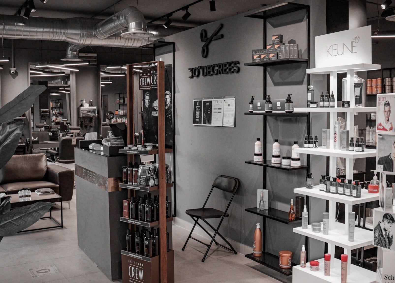 Sophisticated salon interior of Al Izdihar 30 Degrees in Riyadh, Riyadh Province, SA, featuring product displays.