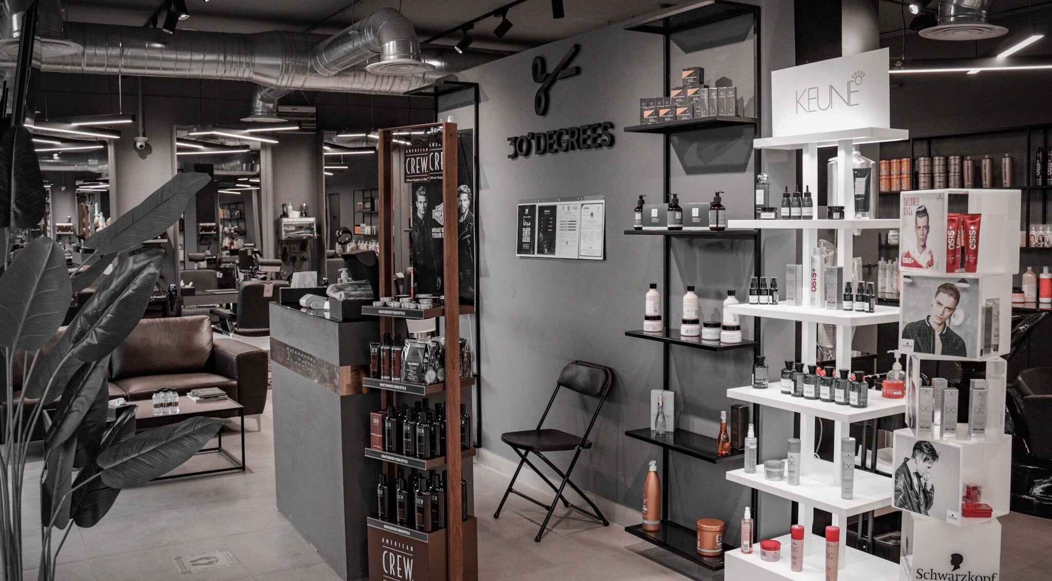 Sophisticated salon interior of Al Izdihar 30 Degrees in Riyadh, Riyadh Province, SA, featuring product displays.