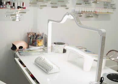 Modern nail station at Bronx Opal, New York, featuring stylish manicure tools.