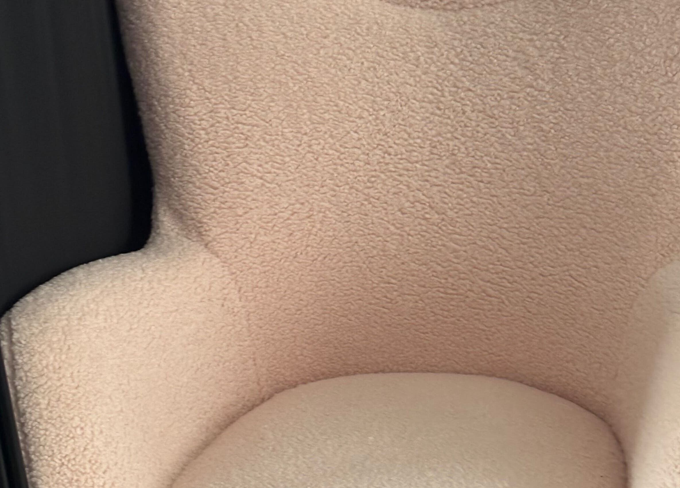 Plush pink chair at Torvelle Beauty in Churchdown, England, GB offering a luxurious, comfortable setting.