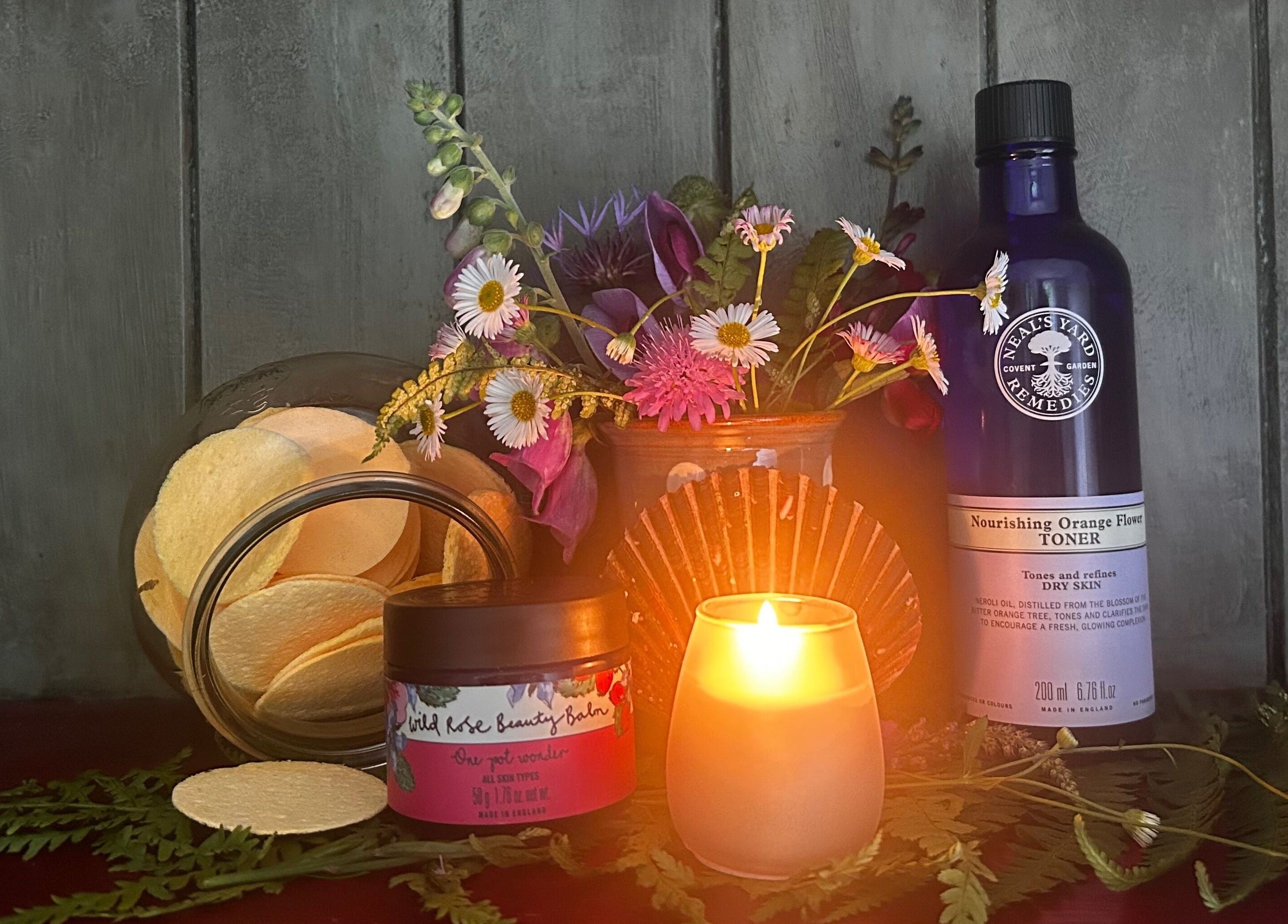 Tranquil spa products with candlelight at Bethesda Beauty in Rawdon, England, GB.
