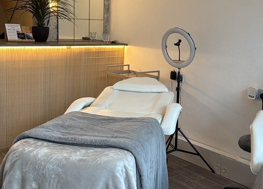 Cozy treatment room at Lashedbycourtxx, Stalybridge, England, GB with elegant decor and modern equipment.