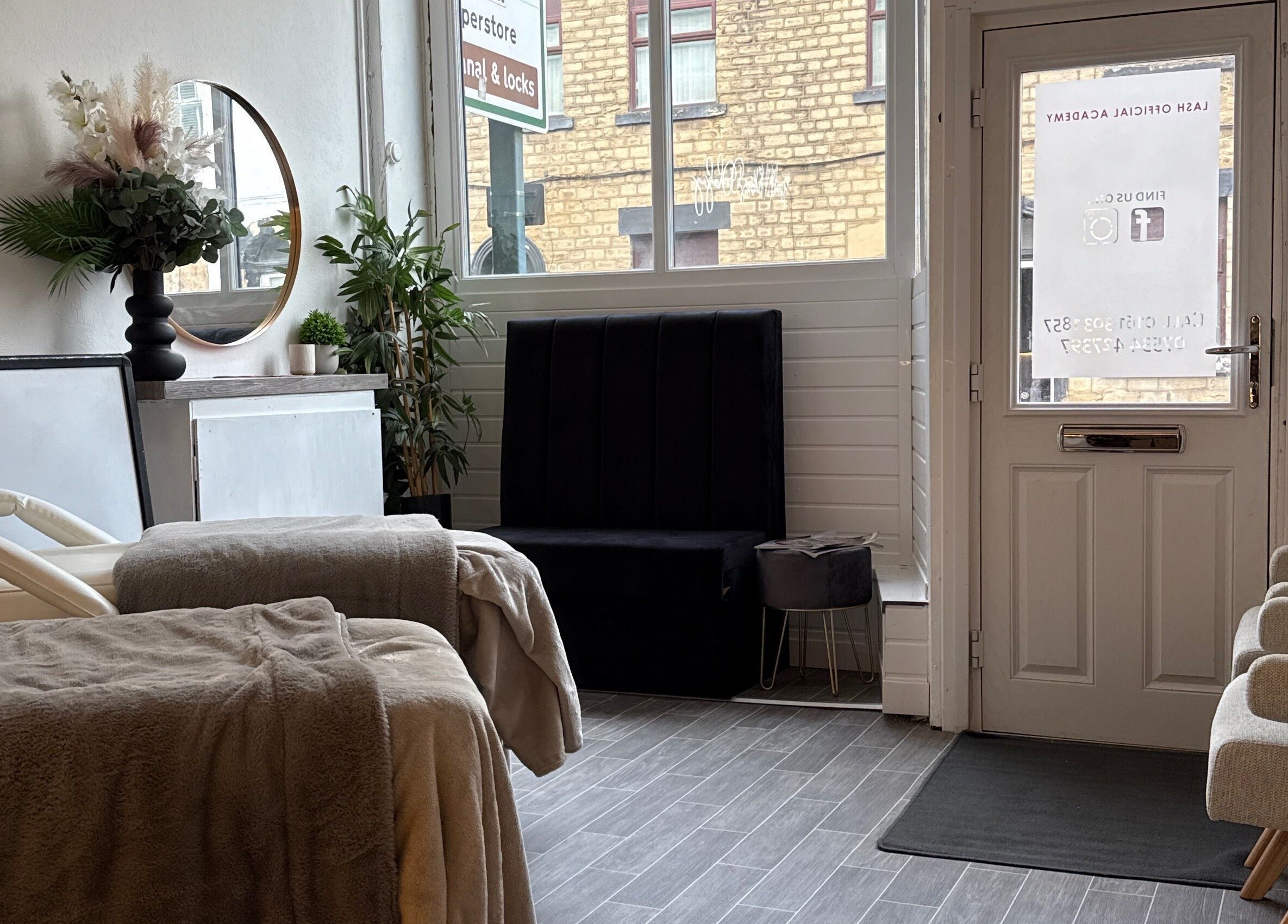 Comfortable interior of Lashedbycourtxx in Stalybridge, England, GB with elegant decor and inviting seating.