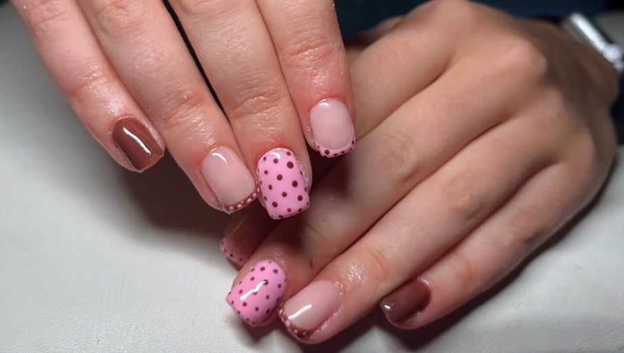Polka dot and nude nail design at EM Nails, Belfast, Northern Ireland, GB.