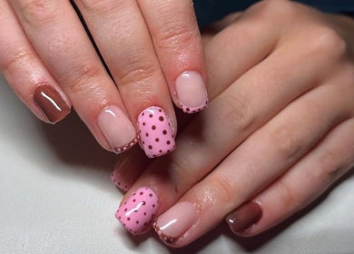 Polka dot and nude nail design at EM Nails, Belfast, Northern Ireland, GB.