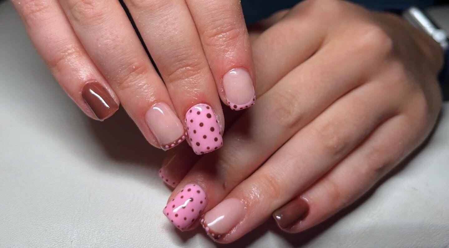 Polka dot and nude nail design at EM Nails, Belfast, Northern Ireland, GB.