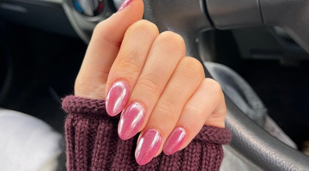 Pink glitter nail design by EM Nails in Belfast, Northern Ireland, GB.