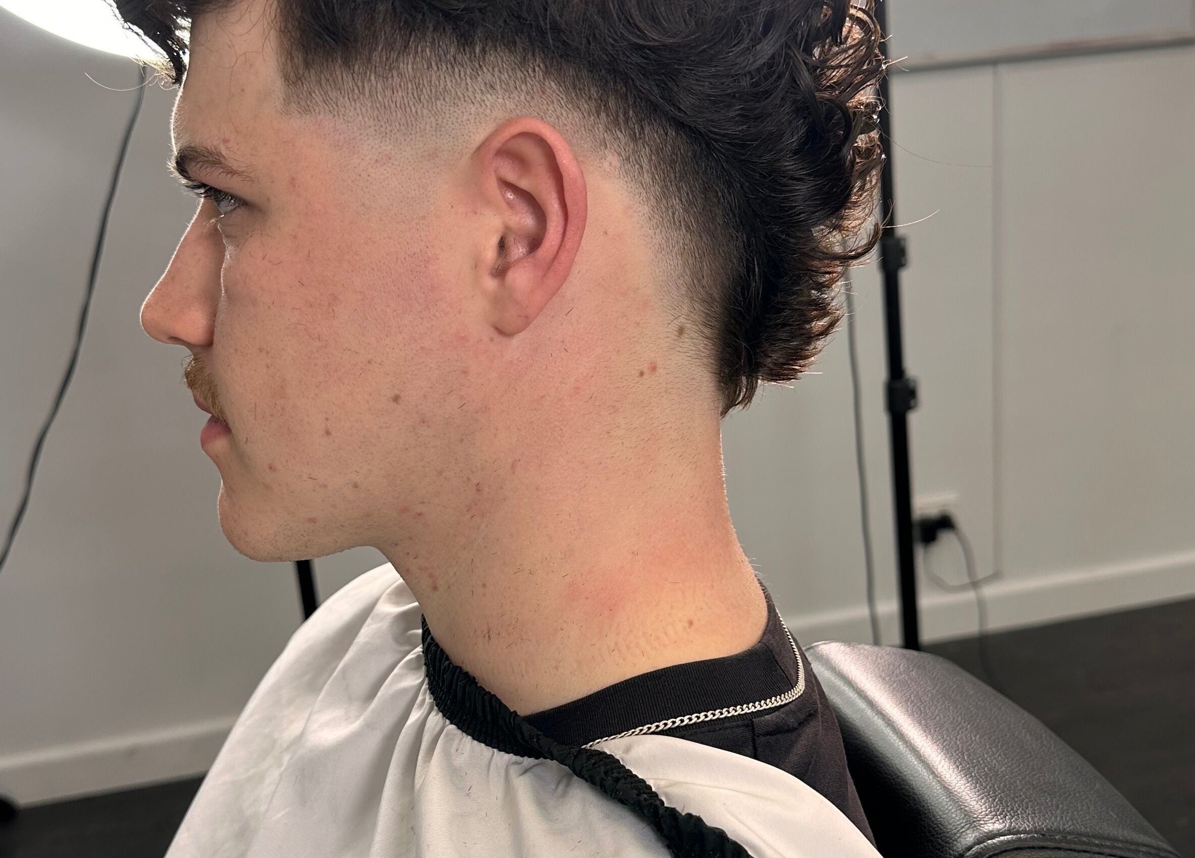 Modern fade haircut at Noble Blendz, Melbourne, Victoria, AU. Showcases expert barber skills.