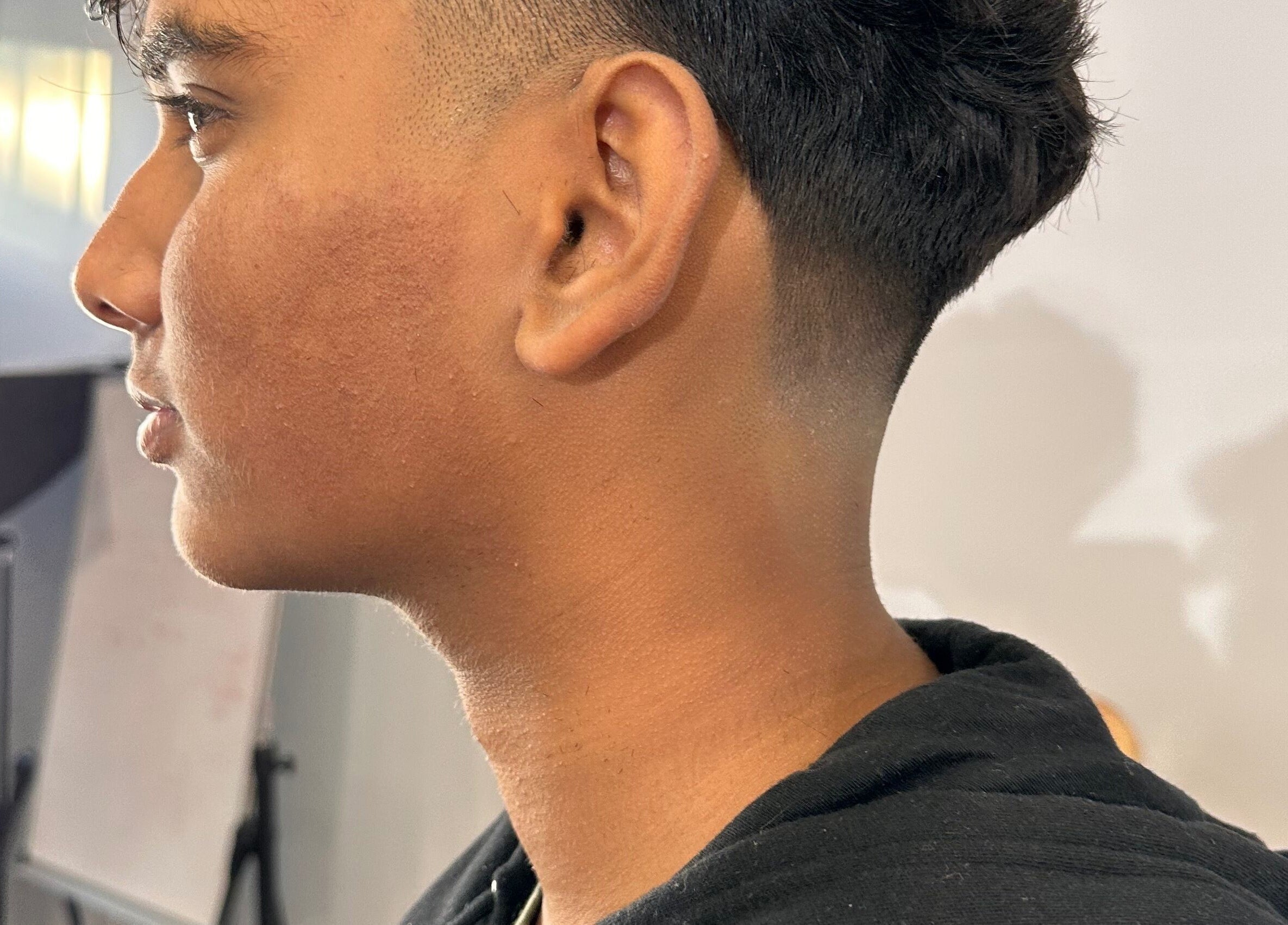 Close-up of a stylish haircut at Noble Blendz, Melbourne, Victoria, AU.