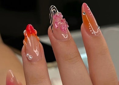 Creative nail art at Nails Džo, Novi Sad, Vojvodina, RS showcasing vibrant and intricate designs.