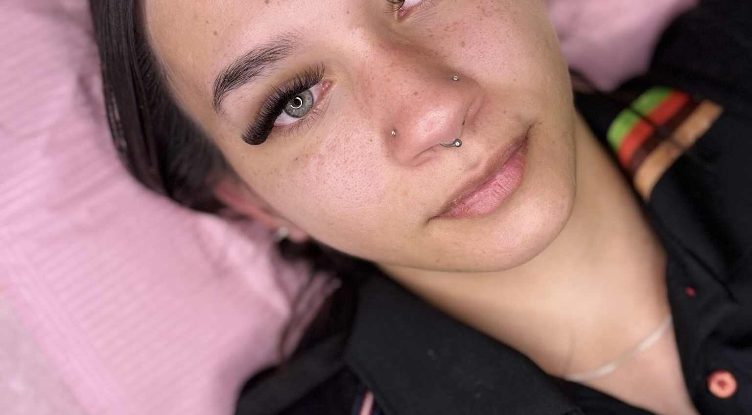 Client with enhanced eyelashes at M&M BEAUTY, Kelso, Queensland, AU, showcasing expert beauty services.