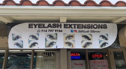 Eyelash extension advertisement at Silklash Nbrow, Costa Mesa, California, US showcasing various styles.