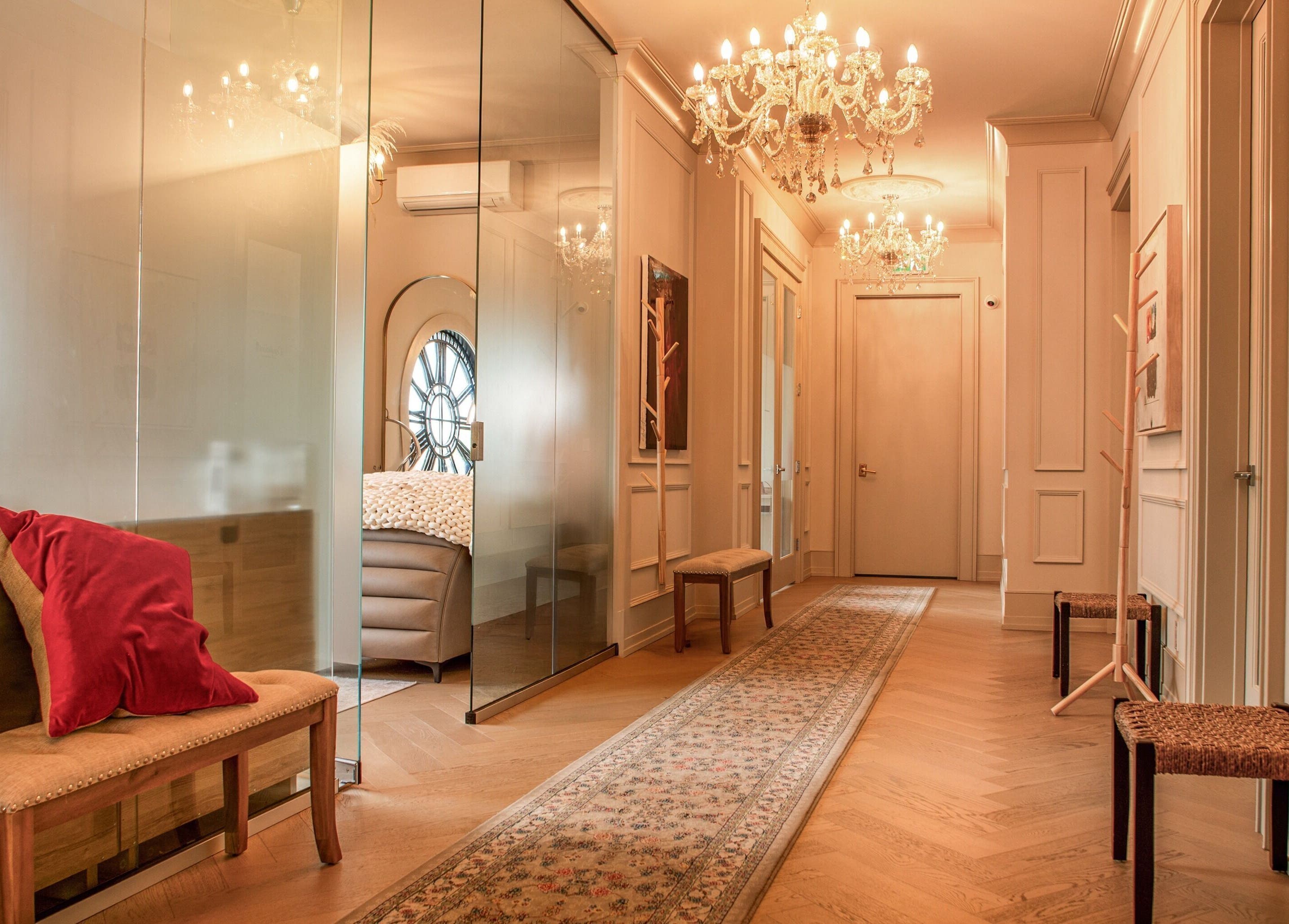Elegant hallway with chandeliers at Confidents Teeth Whitening, Calgary, Alberta, CA.