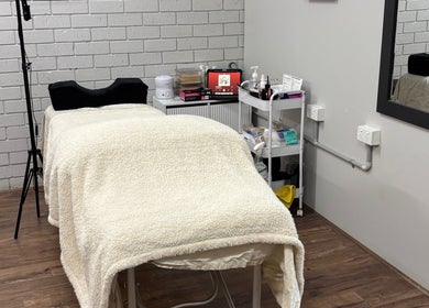 Cozy treatment room at Ethereal Beauty Therapy in Christies Beach, South Australia, AU, featuring a plush massage table.