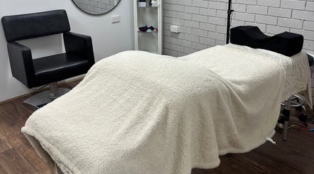 Tranquil treatment room at Ethereal Beauty Therapy, Christies Beach, South Australia, AU with cozy therapy bed.