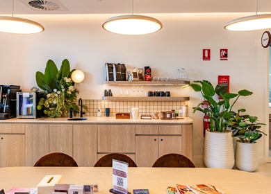 Cozy coffee corner at HoneySpot Beauty Room, Bondi Junction, New South Wales, AU, featuring modern decor.