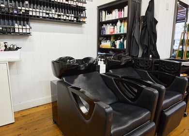 Modern shampoo chairs at Jenny's Hair Affair, Potts Point, New South Wales, AU, inviting luxury hair treatments.
