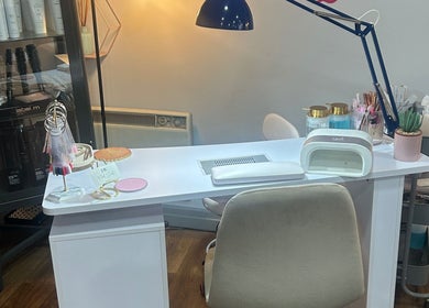 Stylish nail station at IW Nail Studio, Swindon, England, GB with modern decor for beauty treatments.
