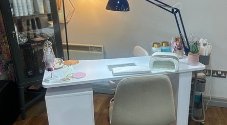 Stylish nail station at IW Nail Studio, Swindon, England, GB with modern decor for beauty treatments.