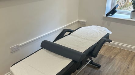 Therapy room with massage table at J Burgess Sports Therapy, Merthyr Tydfil, Wales, GB.