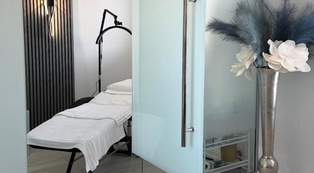 Serene treatment room at More Than Skin By Diane, East Kilbride, Scotland, GB, with elegant decor and treatment bed.