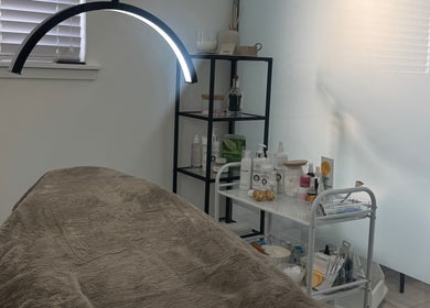Tranquil therapy room at More Than Skin By Diane, East Kilbride, Scotland, GB, featuring a cozy treatment bed.