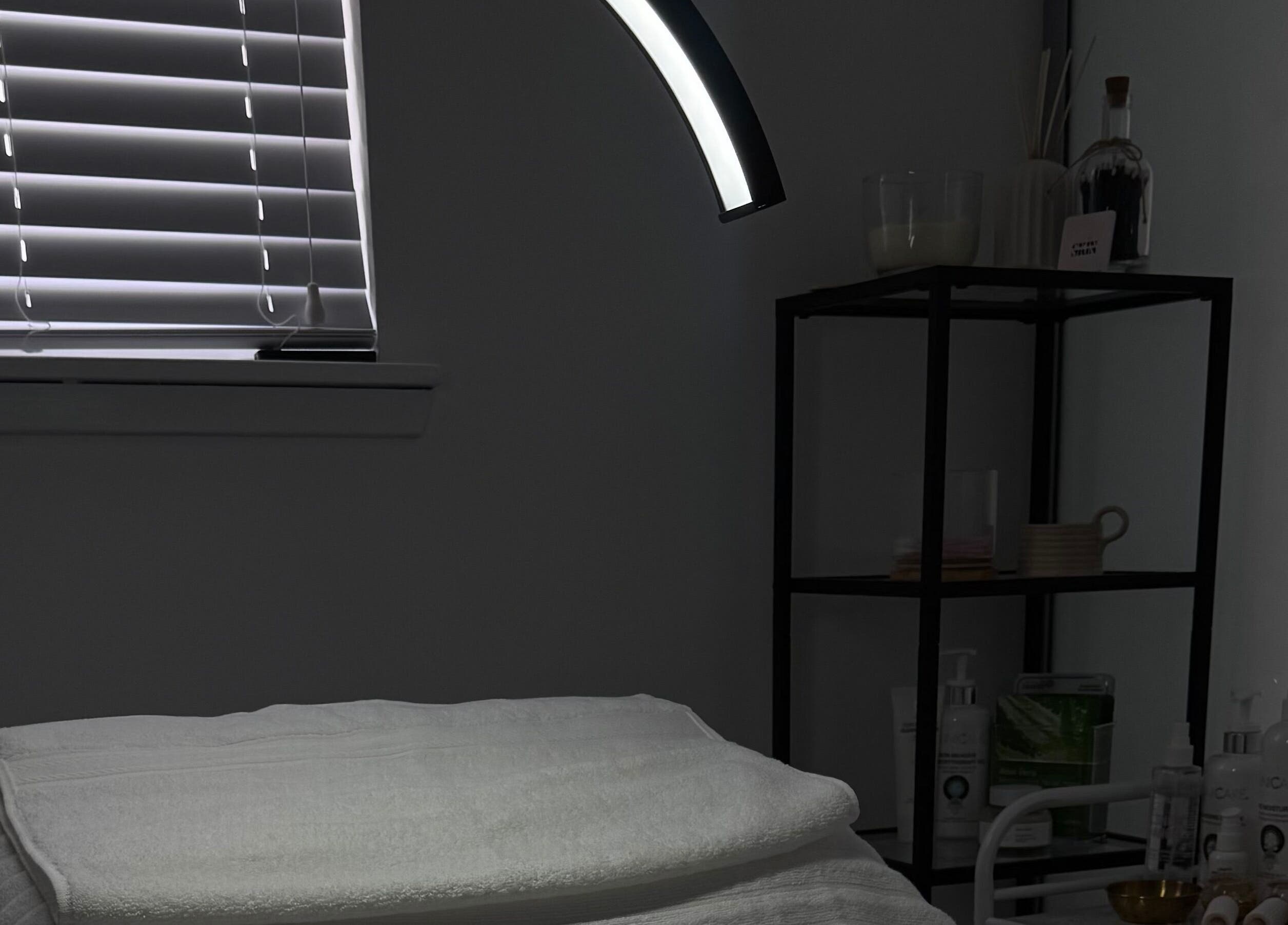 Treatment room at More Than Skin By Diane, featuring a cozy massage table in Hamilton, Scotland, GB.