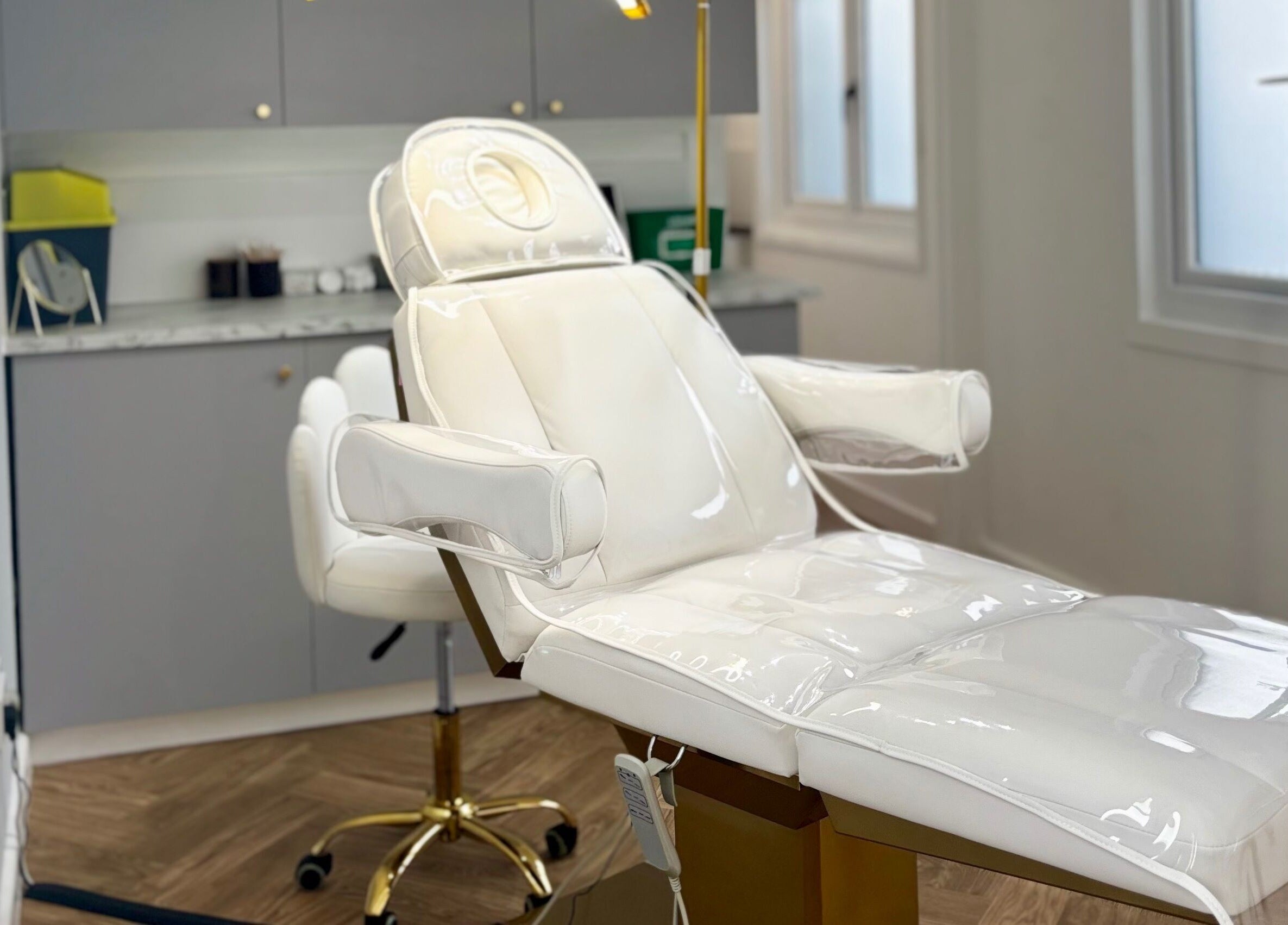 Luxurious treatment room at House Of Hamilton Aesthetics, Hemel Hempstead, England, GB featuring a premium chair.