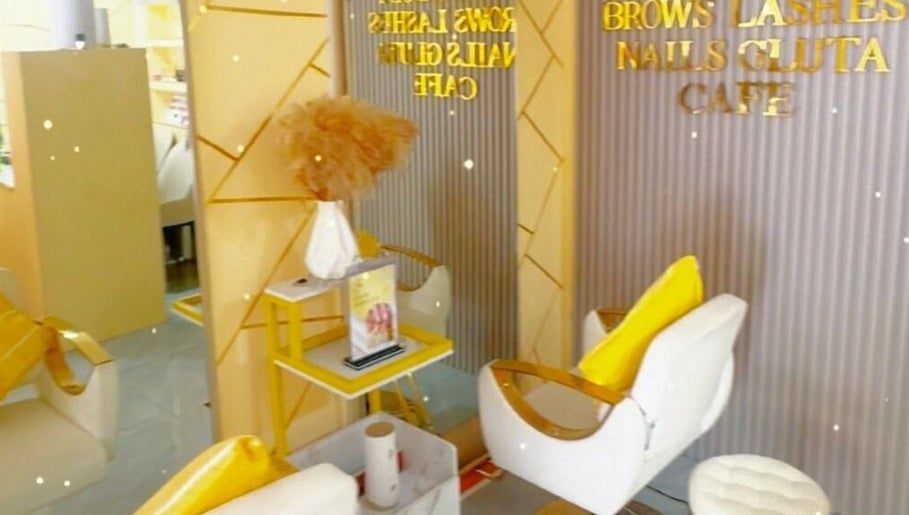Chic interior of Glam N Vein Beauty Lounge - Sto Entierro in Angeles, Central Luzon, PH with yellow accents.