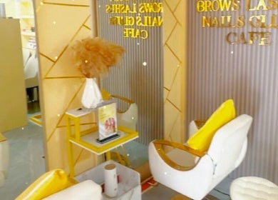 Chic interior of Glam N Vein Beauty Lounge - Sto Entierro in Angeles, Central Luzon, PH with yellow accents.