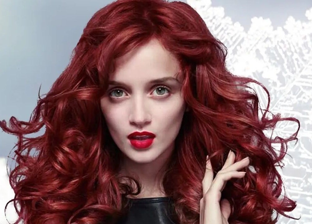 Vibrant red hair styling at Gatsby Studio Salon and Spa in Toronto, Ontario, CA. Perfect for bold beauty transformations.