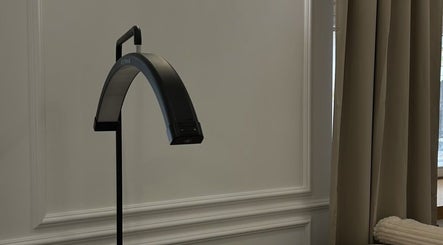 Contemporary lamp in a serene room at GLAMBY GIA, Melbourne, Victoria, AU.