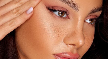Close-up of a woman's luminous face showcasing makeup at GLAMBY GIA in Melbourne, Victoria, AU.