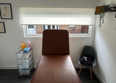Deaconsbank Physiotherapy therapy room with treatment bed in Glasgow, Scotland, GB.