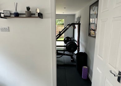 Modern gym equipment at Deaconsbank Physiotherapy, Glasgow, Scotland, GB, promoting health and wellness.