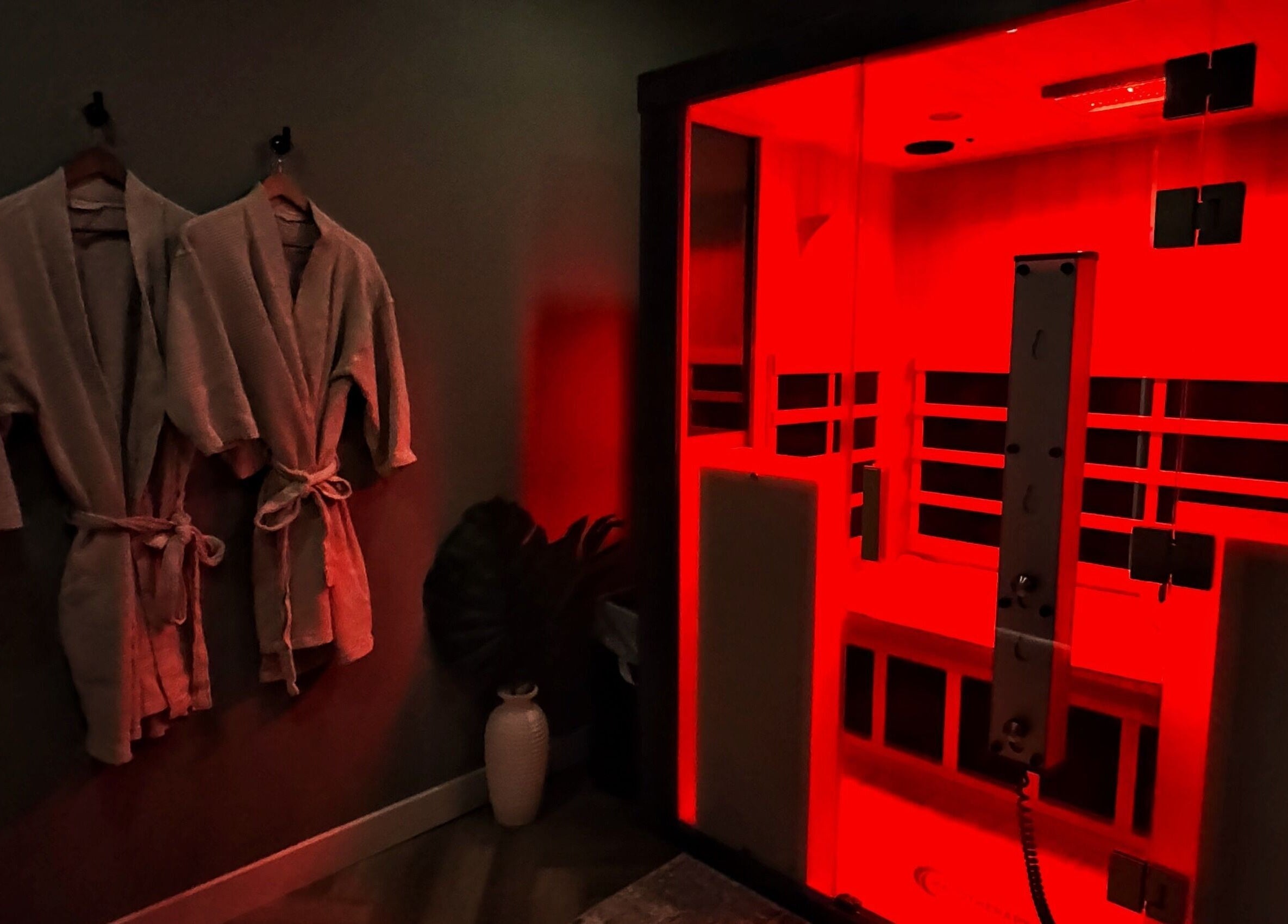 Infrared sauna and robes at La Luma Spa & Aesthetics, Drumheller, Alberta, CA offering a relaxing experience.