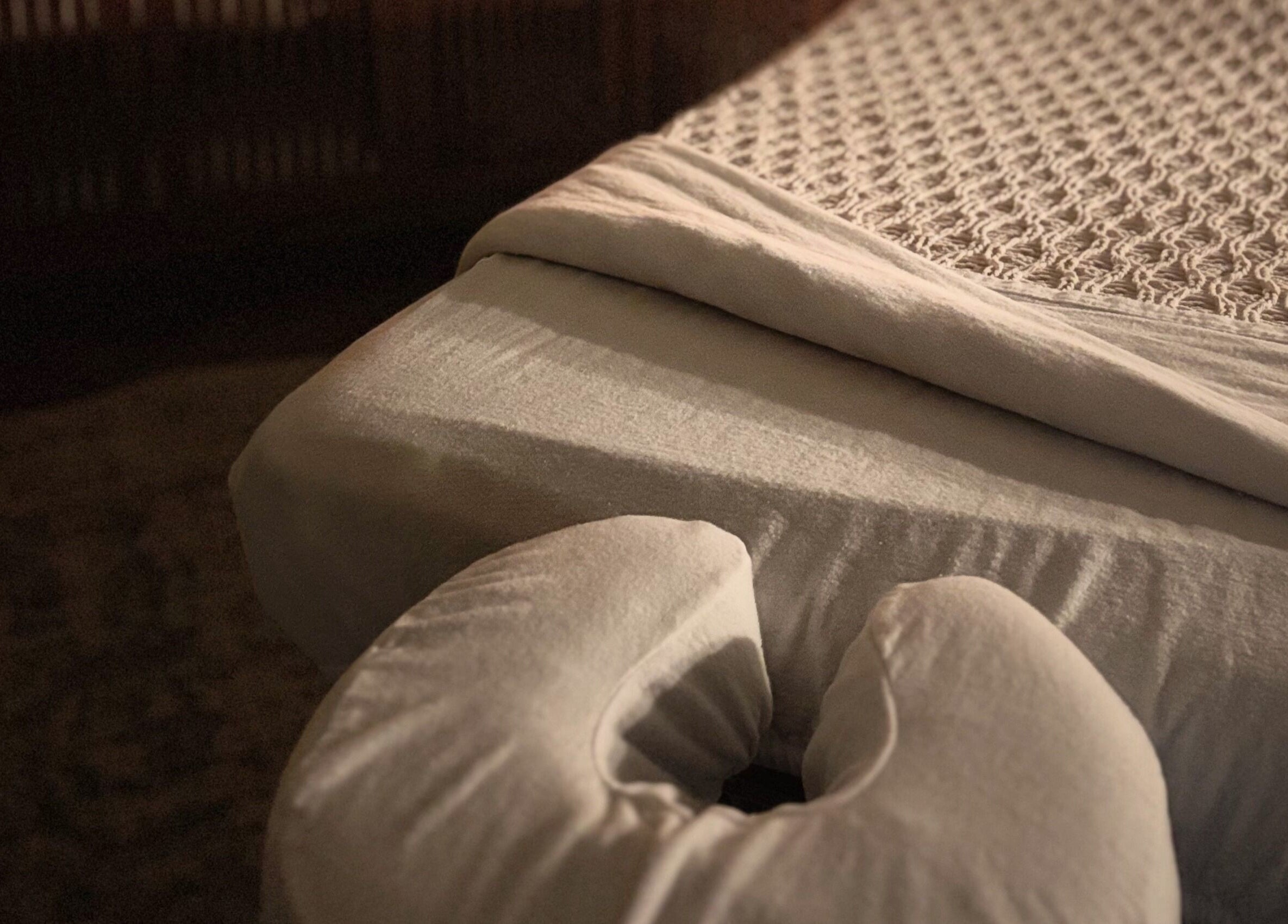 Luxurious massage table at La Luma Spa & Aesthetics in Drumheller, Alberta, CA offers ultimate relaxation.