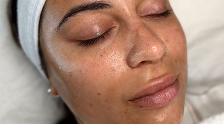 Relaxed woman with glowing skin at Megan Lou - Wellness | Skin | Eyebrows, Leicester, England, GB.